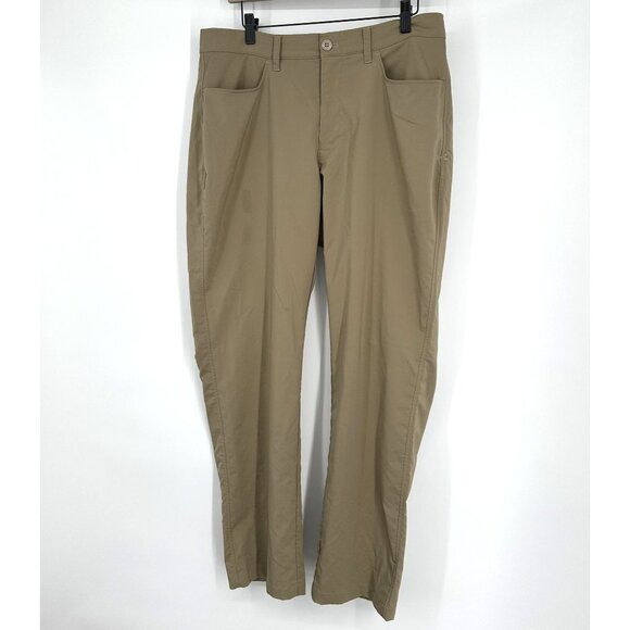 Under Armour Men's Tan Pants Loose Size 34/32 - Picture 1 of 5